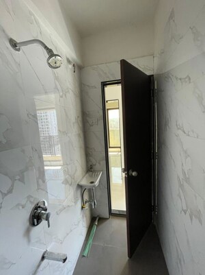 Bathroom in 1 BHK Apartment at Velocity Hill Spring, Ghodbunder Road – for Rent