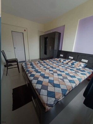 Bedroom in 2 BHK Apartment at Duville Riverdale Heights, Kharadi – for Rent