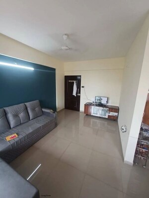 Living Room in 2 BHK Apartment at Duville Riverdale Heights, Kharadi – for Rent
