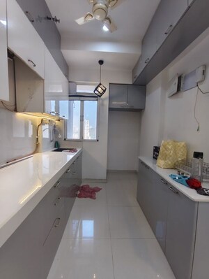 Kitchen in 2 BHK Apartment at Puranik Tokyo Bay Phase 2A, Kasarvadavali – for Rent