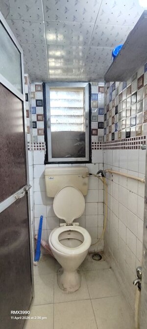Bathroom in 2 BHK Apartment at The Kamal Sagar CHS, Bhandup East – for Rent