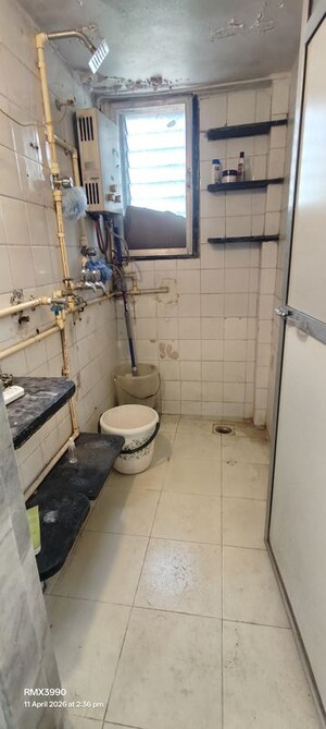 Bathroom in 2 BHK Apartment at The Kamal Sagar CHS, Bhandup East – for Rent