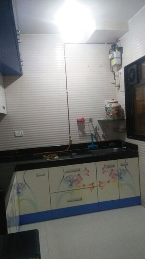 Kitchen in 2 BHK Apartment at Cosmos Jewels, Ghodbunder Road – for Rent