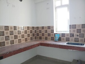 Kitchen in 2 BHK Apartment at Uninav Heights Phase II, Raj Nagar Extension – for Sale