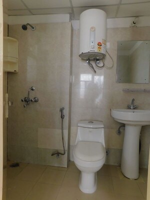 Bathroom in 2 BHK Apartment at Uninav Heights Phase II, Raj Nagar Extension – for Sale