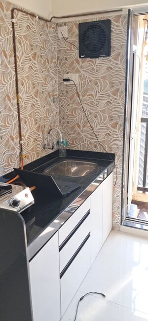 Kitchen in 1 BHK Apartment at Raunak Residency Thane, Pokhran Road No One – for Rent