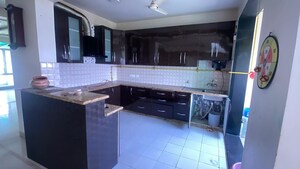 Kitchen in 3 BHK Penthouse at Panchsheel Green – for Rent