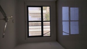 Room in 2 BHK Apartment at Kalpataru Immensa B, Kolshet Road – for Rent