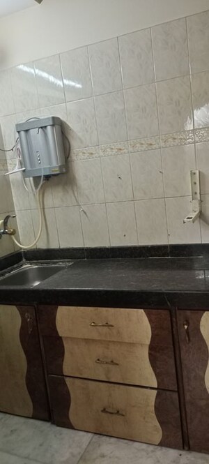 Kitchen in 1 BHK Apartment at God Gifts Building, Lower Parel – for Rent