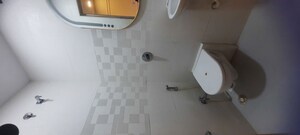 Bathroom in 1 BHK Apartment at Rushabh Arihant CHS, Andheri West – for Sale