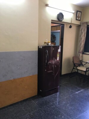 Living Room in 1 BHK Apartment at Juhu – for Rent