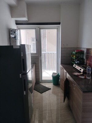 Kitchen in 2 BHK Builder Floor at Gaur Yamuna City 16th Park View, Gaur Yamuna City – for Rent