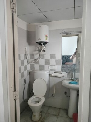 Bathroom in 2 BHK Builder Floor at Gaur Yamuna City 16th Park View, Gaur Yamuna City – for Rent