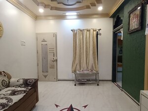 Living Room in 2 BHK Apartment at Neeta Park Society, Yerawada – for Rent