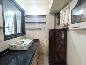 Kitchen in 2 BHK Apartment at Neeta Park Society, Yerawada – for Rent