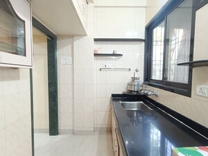 Kitchen in 2 BHK Apartment at Neeta Park Society, Yerawada – for Rent
