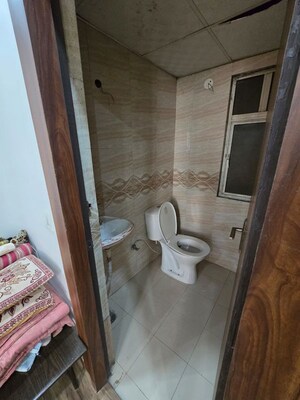 Bathroom in 4 BHK Apartment at Dwarika Raj Garden City, Raj Nagar Extension – for Sale