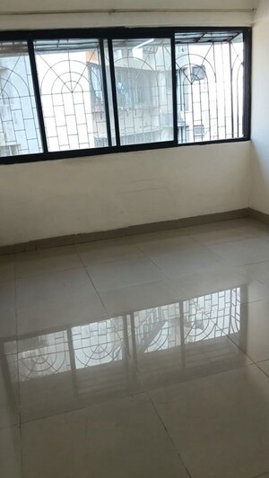 Bedroom in 1 BHK Apartment at Lokhandwala Complex – for Rent