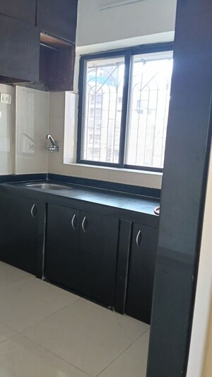 Kitchen in 1 BHK Apartment at Lokhandwala Complex – for Rent