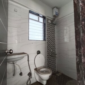 Bathroom in 1 BHK Apartment at Bimbisaar Nagar CHS, Goregaon East – for Rent