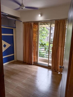 Bedroom in 2 BHK Apartment at Shri Siddhivinayak Tower, Dombivli West – for Rent