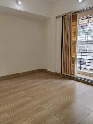 Bedroom in 2 BHK Apartment at Shri Siddhivinayak Tower, Dombivli West – for Rent