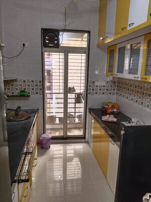 Kitchen in 2 BHK Apartment at Shri Siddhivinayak Tower, Dombivli West – for Rent