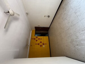 Living Room in 2 BHK Apartment at Satellite Garden, Goregaon East – for Rent