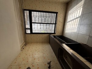 Kitchen in 2 BHK Apartment at Satellite Garden, Goregaon East – for Rent