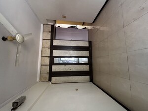 Bedroom in 2 BHK Apartment at Satellite Garden, Goregaon East – for Rent