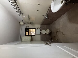 Bathroom in 2 BHK Apartment at Satellite Garden, Goregaon East – for Rent