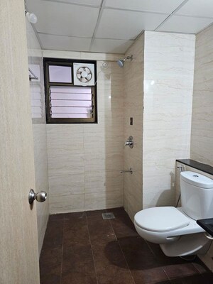 Bathroom in 2 BHK Apartment at Paranjape Blue Ridge, Hinjewadi – for Rent