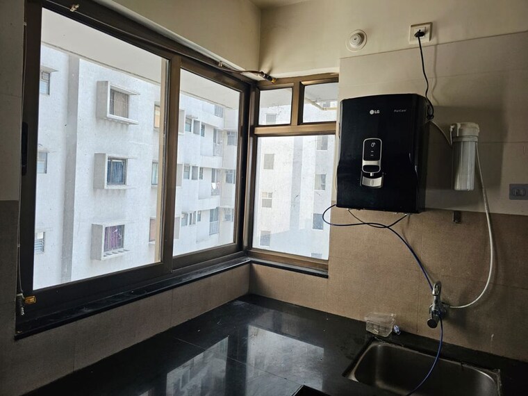 Kitchen, paranjape-blue-ridge 2 Bedroom 1030 Sq.Ft. Apartment In Hinjewadi Pune 10274697