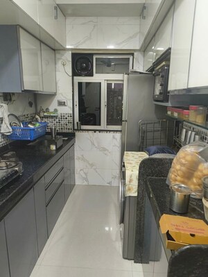 Kitchen in 2 BHK Apartment at DGS Sheetal Tapovan, Malad East – for Rent