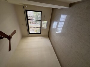 Room in 2 BHK Apartment at Riddhi Garden, Malad East – for Rent