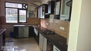 Kitchen in 1 BHK Builder Floor at Risland Sky Mansion, Chattarpur – for Rent