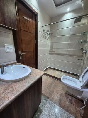 Bathroom in 1 BHK Builder Floor at Palm Residency Chhatarpur, Chattarpur – for Rent