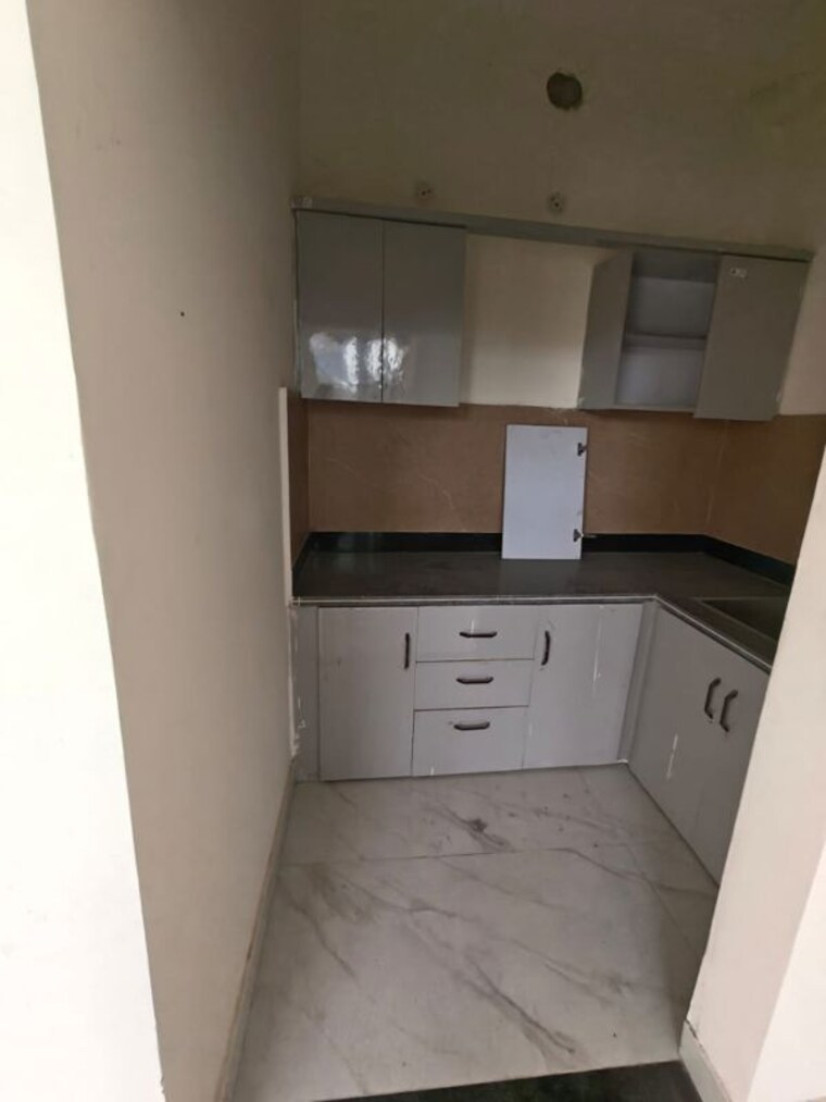 Kitchen, sikka-kaamna-greens 2 Bedroom 850 Sq.Ft. Apartment In Sector 143a Noida Noida 10274847