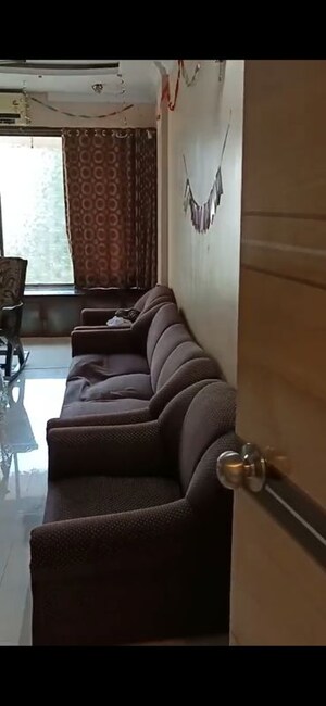 Living Room in 2 BHK Apartment at Rameshwar Darshan CHS, Andheri West – for Rent