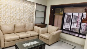 Living Room in 1.5 BHK Apartment at Ankur Building, Malad West – for Rent