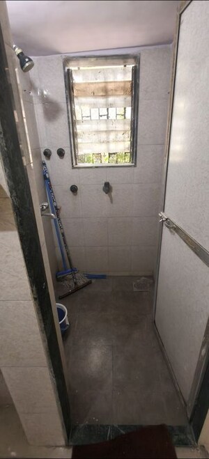 Bathroom in 1 BHK Apartment at Haridwar CHS Malad, Malad West – for Rent