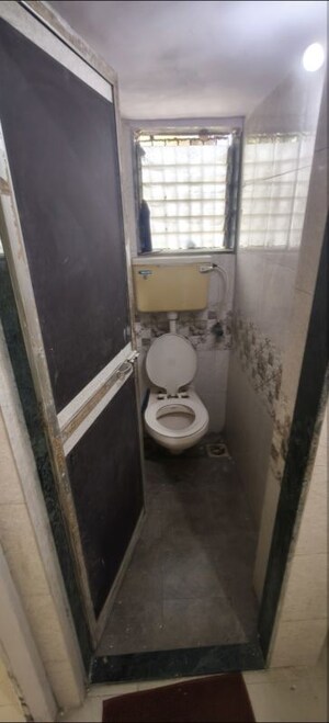 Bathroom in 1 BHK Apartment at Haridwar CHS Malad, Malad West – for Rent