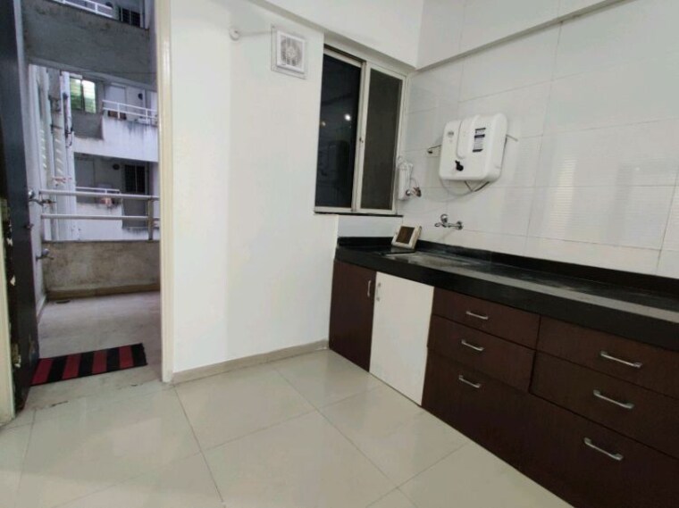 Kitchen, goel-ganga-cypress 2 Bedroom 850 Sq.Ft. Apartment In Tathawade Pune 10275006