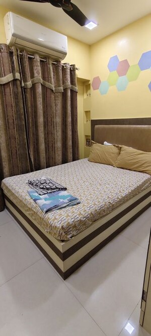 Bedroom in 2 BHK Apartment at Shri Balaji Ashirwad, Malad West – for Sale