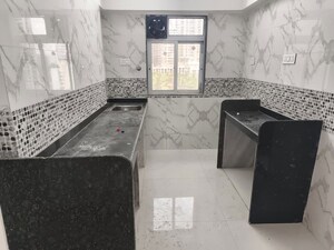 Kitchen in 1 BHK Apartment at Omkar Signet, Malad East – for Rent