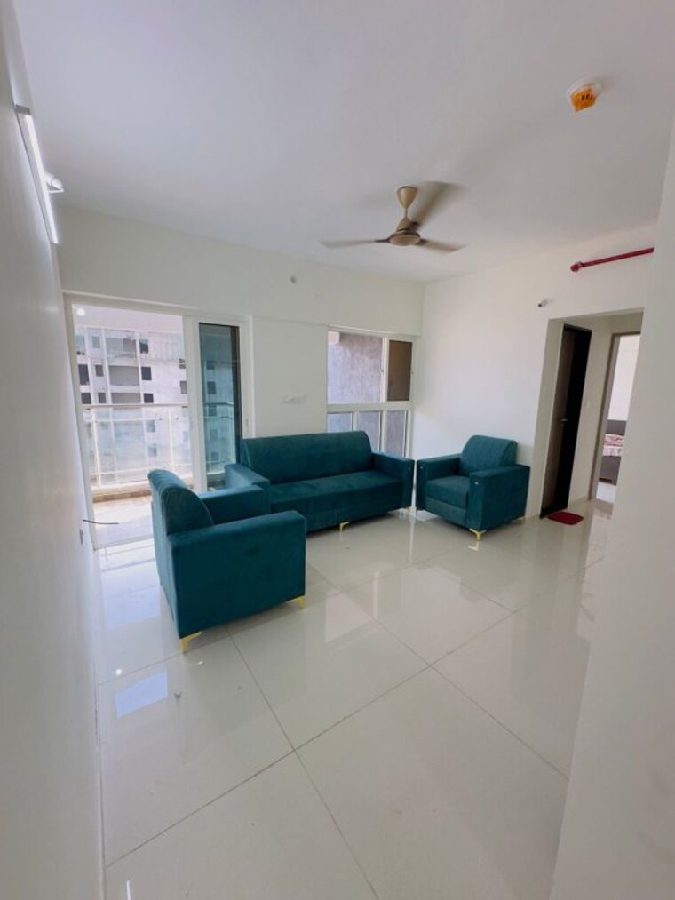 Living Room, paranjape-trident-towers 2 Bedroom 940 Sq.Ft. Apartment In Wakad Pune 10275207