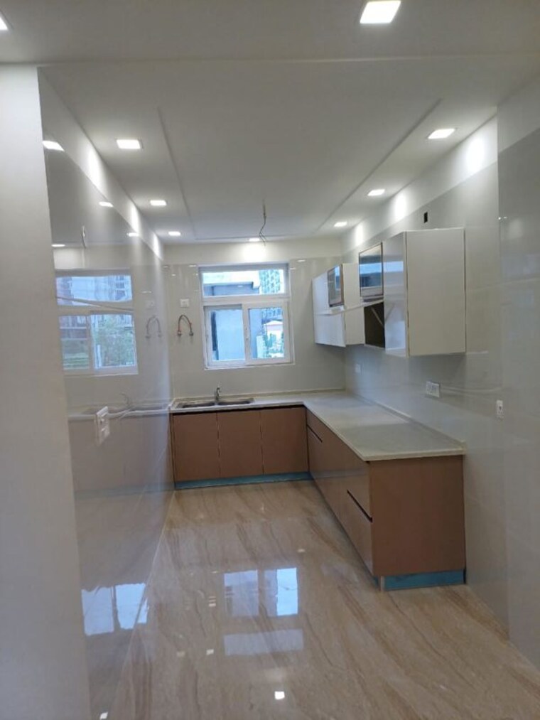 Kitchen, bptp-district-phase-2 3 Bedroom 150 Sq.Yd. Builder Floor In Sector 84 Faridabad 10275294