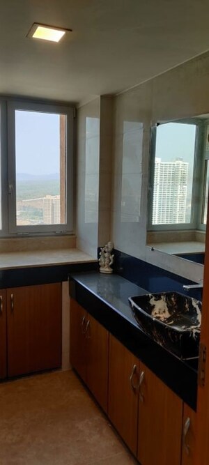 Kitchen in 6+ BHK Apartment at DB Orchid Woods, Goregaon East – for Sale