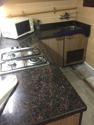 Kitchen in 2 BHK Builder Floor at New Friends Colony – for Rent