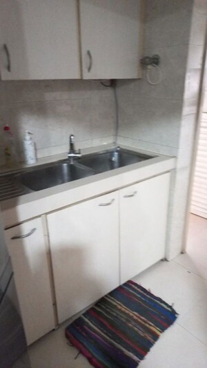 Kitchen in 3 BHK Apartment at Lokhandwala Whispering Palms, Kandivali East – for Rent